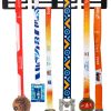Wieszak na medale sportowe z medalami